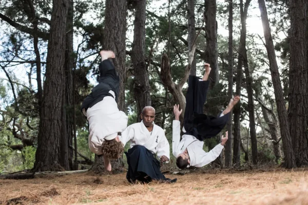 Joe Thambu Shihan in a pine forest
